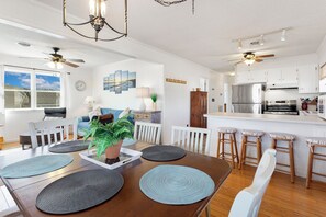 Eat together in the quaint Dining Area with natural light and beautiful decor.