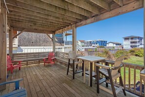 Relax out on the Covered Deck with a cool drink and an ocean breeze.