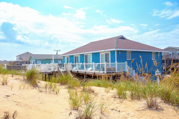 Take one step off the deck and you'll be able to feel the sand between your toes, at this sunny oceanfront retreat.