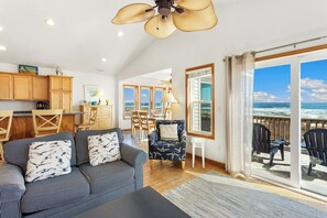 Spacious living area with panoramic ocean views.