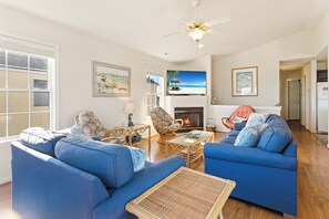 Gather together in the Living Area with a Fireplace for a board game or head over into the nearby Lounge Area for family movie night.