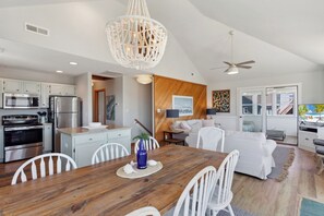 Eat together in the Dining Area with views of the ocean.