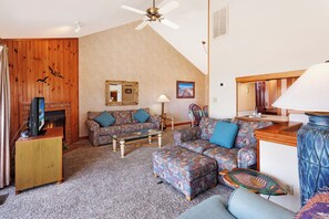Relax in the beautiful Living Area with a large, Flat Screen TV and Fireplace for a little extra luxury during those off-season stays.