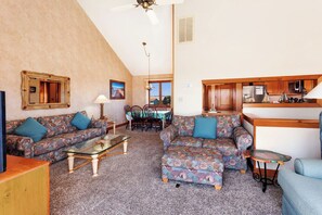 Relax in the beautiful Living Area with a large, Flat Screen TV and Fireplace for a little extra luxury during those off-season stays.