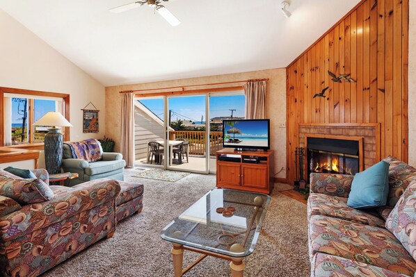 Relax in the beautiful Living Area with a large, Flat Screen TV and Fireplace for a little extra luxury during those off-season stays.