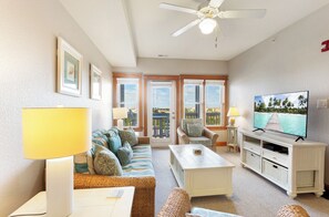Relax in the spacious Living Area with gorgeous views and a large Flat Screen TV.