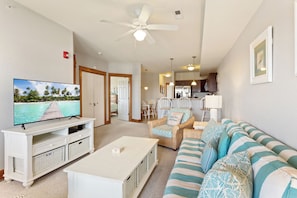 Relax in the spacious Living Area with gorgeous views and a large Flat Screen TV.