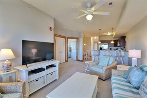 Relax in the spacious Living Area with gorgeous views and a large Flat Screen TV.