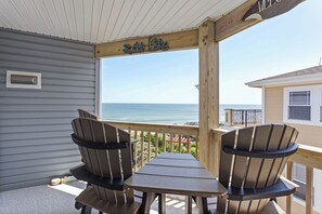 Relax on the deck with a cool drink and views of the ocean.