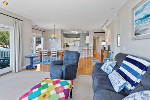 The open-concept Living Area is perfect for soaking up that OBX sunshine.