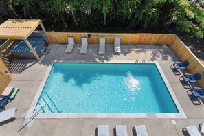 Swim a few laps in your 14'x32' private pool and then relax in the gazebo-covered hot tub.