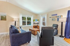 Relax in the spacious Living Area with a Flat Screen TV!