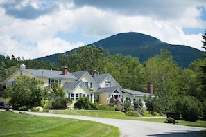 The Red Clover Inn Main House with Pico Mountain background (summer)