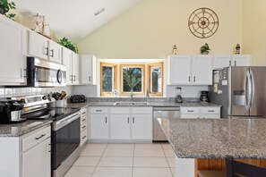 The modern Kitchen is perfect for preparing a delicious meal.