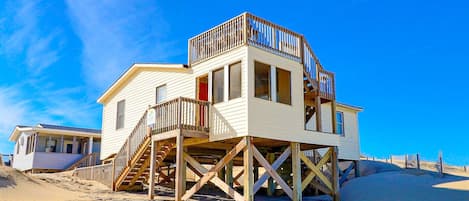 This home sits right on the beach!

*NOTE: Sand may accumulate on the beach walkway during certain parts of the year. This may make the walkway not suitable for guests with mobility issues.