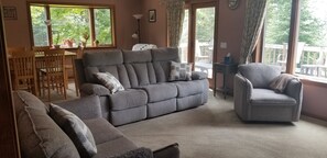 comfortable living room w/deck access