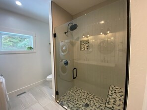 River Rock seat in the shower. We love this shower! It is beautiful!