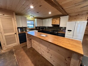 Large kitchen island adds beauty and functionality