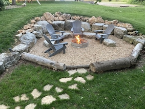 Perfect place to sit and roast a marshmallow or a hot dog. Families and friends love this private fire-pit on the edge of the woods. You bring the marshmallows and we will provide the rest!
