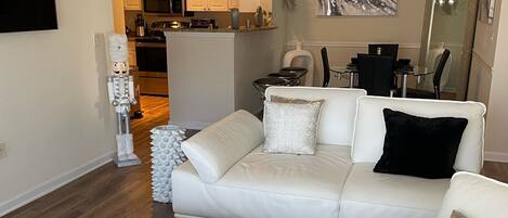 Living room: Lovely all white Italian sectional very cozy while watching tv