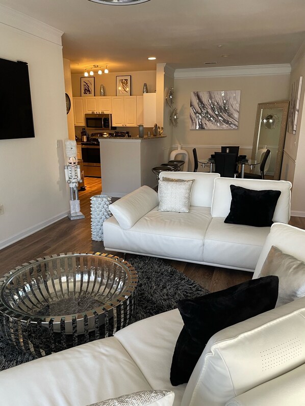 Living room: Lovely all white Italian sectional very cozy while watching tv