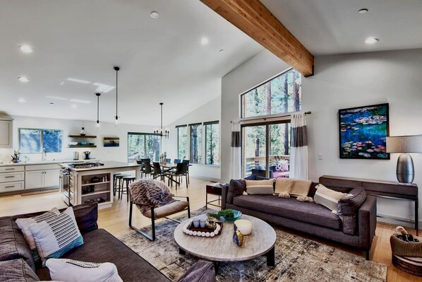 Chic living area with a sleek couch and modern table ideal for quiet moments or casual conversation.