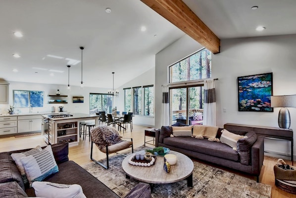 Chic living area with a sleek couch and modern table ideal for quiet moments or casual conversation.