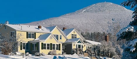 The Red Clover Inn Main House with Pico Mountain background (winter)