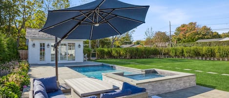 Large outdoor patio and pool house