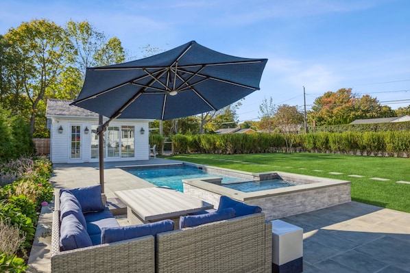 Large outdoor patio and pool house