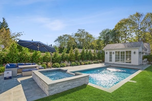 Pool (electric cover) and spa with waterfall