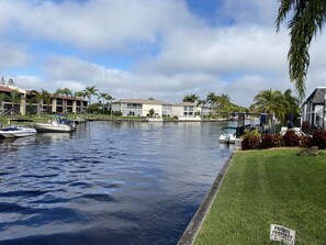 Waterfront condo sits right on the canal.  Watch for dolphins, manatees, & more!