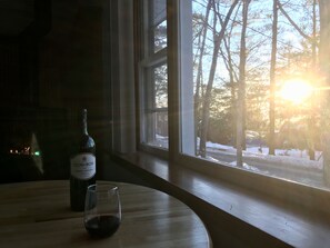 Enjoy the lake view & sunsets from the dining room table all year long