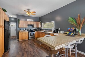 Our beautiful, modern kitchen is very spacious! It has more than enough space if everyone wants to join the fun in preparing the meals. Book your dream staycation now!