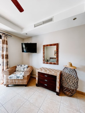 Master bedroom features a Smart TV and access to balcony 1. 