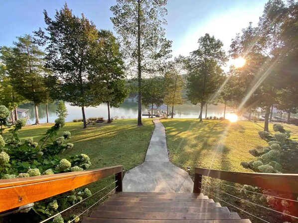 Looking towards lake from back patio, over the backyard.