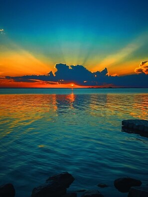 Stunning sunsets from your own private beach front (pic courtesy of past guest)