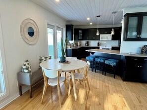 View of the Dining area & Kitchen area fully stocked with all you could need!