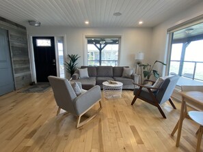 View looking at front entry & living space
