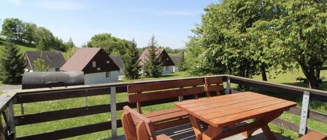 Sky, Property, Furniture, Plant, Cloud, Tree, Wood, Natural Landscape, Table, Outdoor Furniture