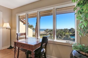 Table with views to ocean & pool