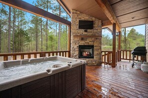 Watch a movie or TV while relaxing in the hot tub. 