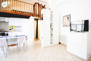 Living room with kitchenette.