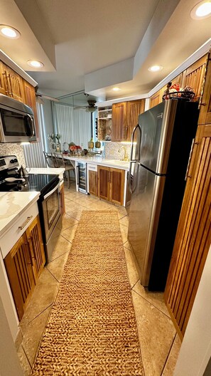 Kitchen featuring new countertops & custom cabinetry