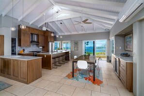 The spacious kitchen and dining area with full AC