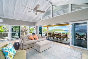 Large and luxurious living room with AC and flat screen TV