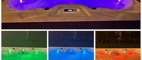 Hot Tub with Multicolor LED lights, Bluetooth, and incredible massaging jets. 