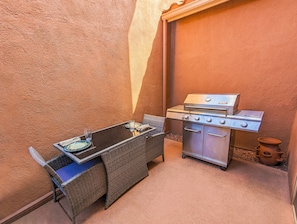 Dedicated BBQ area, perfectly shaded for warming coffee or work.