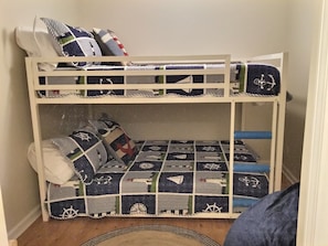 Full-size bunk beds both top and bottom in second bedroom. 