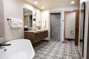 You have to experience this spa-like retreat - the bathroom has beautiful patterned tile, stand alone soaker tub, walk in stone shower and double vani